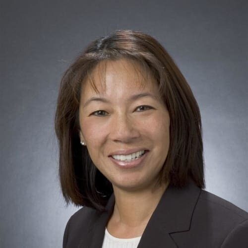 photo_upload_65b042db3625d-2024-01-23 A woman with brown hair and wearing a black jacket.